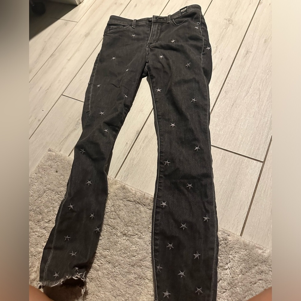 Brand new never worn Abercrombie and Fitch black star jeans in size 25